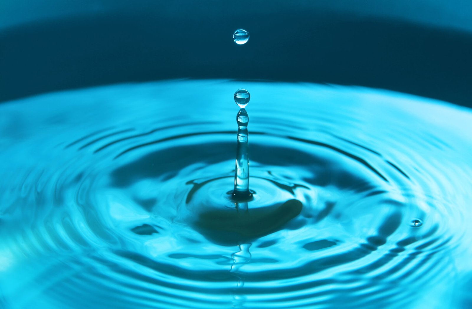 water drop falling into water making a perfect con 2025 03 09 07 14 03 utc scaled